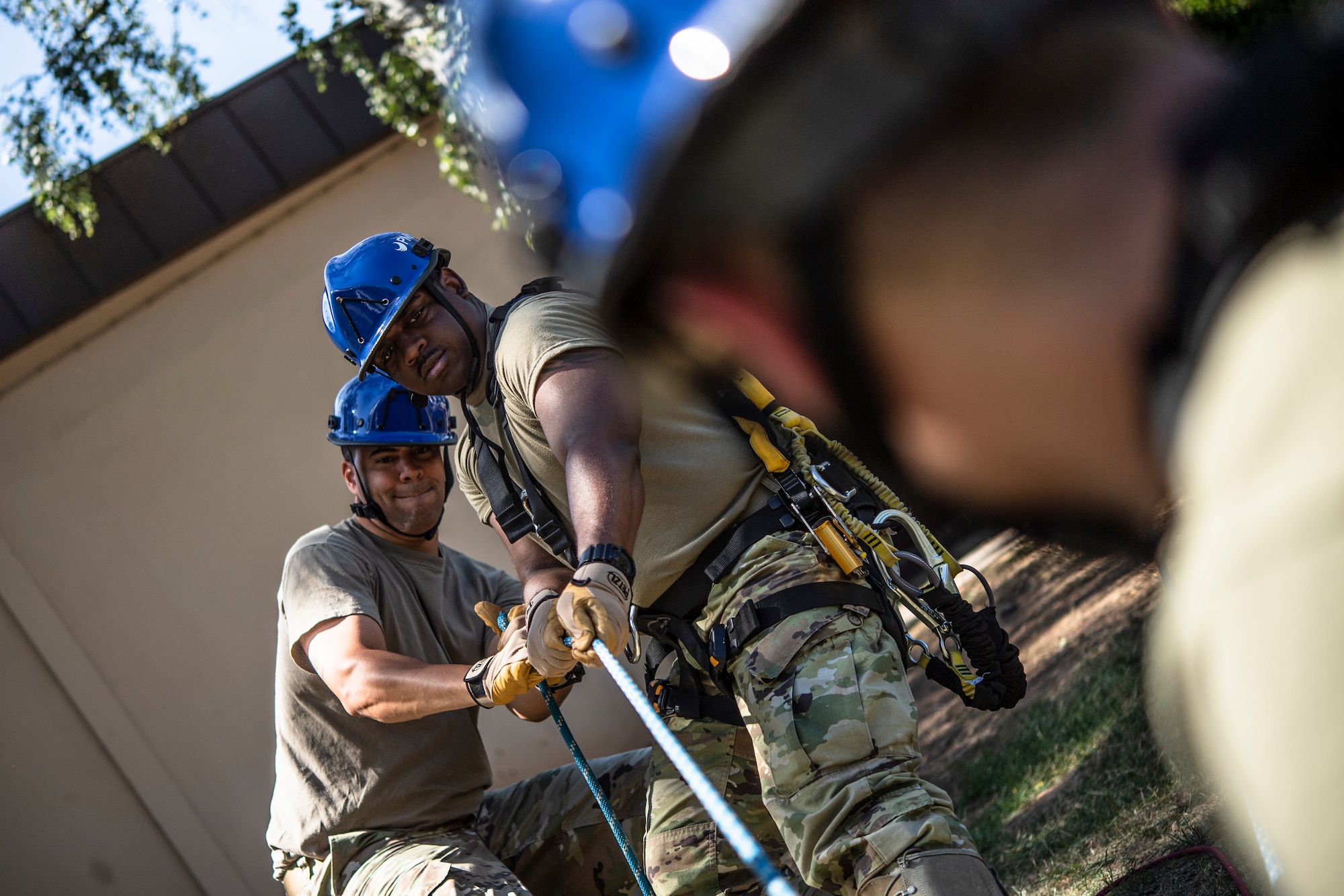 Photo of Airmen conducting tower rescue training