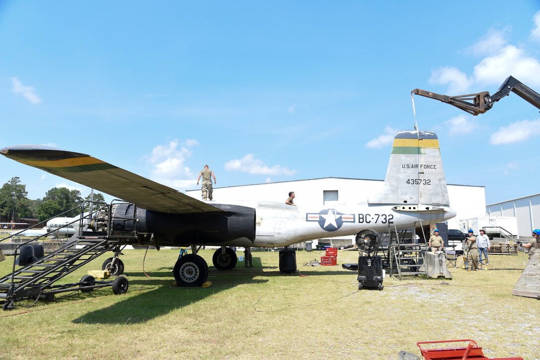 Members of the 117th Maintenance Group disassemble an A-26 Invader at the Museum of Aviation, Warner Robins, Ga., June 22, 2020. This aircraft will be relocated to Sumpter Smith Joint National Guard Base, Birmingham, Ala. (U.S. Air National Guard photo by: Tech. Sgt. Jim Bentley)