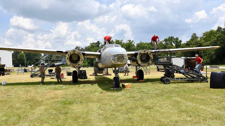 Members of the 117th Maintenance Group disassemble an A-26 Invader at the Museum of Aviation, Warner Robins, Ga., June 22, 2020. This aircraft will be relocated to Sumpter Smith Joint National Guard Base, Birmingham, Ala. (U.S. Air National Guard photo by: Tech. Sgt. Jim Bentley)