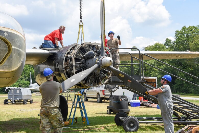 Members of the 117th Maintenance Group disassemble an A-26 Invader at the Museum of Aviation, Warner Robins, Ga., June 22, 2020. This aircraft will be relocated to Sumpter Smith Joint National Guard Base, Birmingham, Ala. (U.S. Air National Guard photo by: Tech. Sgt. Jim Bentley)