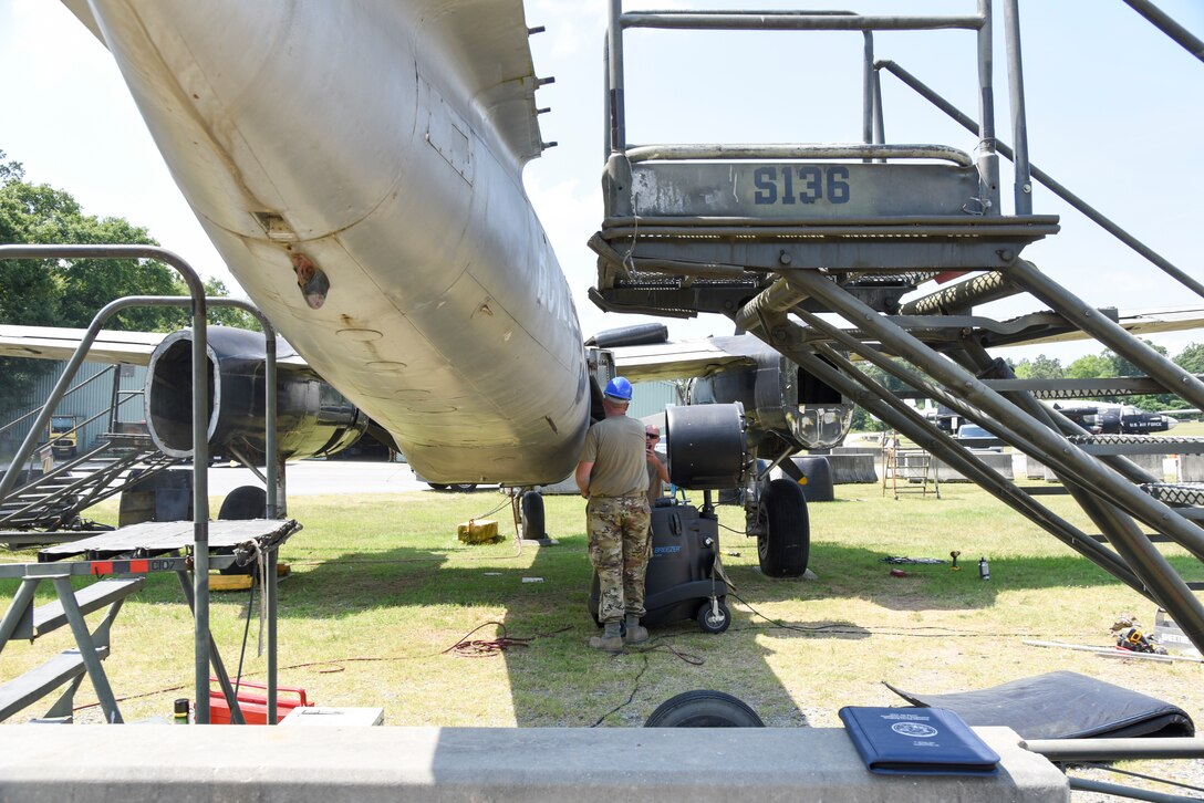Members of the 117th Maintenance Group disassemble an A-26 Invader at the Museum of Aviation, Warner Robins, Ga., June 22, 2020. This aircraft will be relocated to Sumpter Smith Joint National Guard Base, Birmingham, Ala. (U.S. Air National Guard photo by: Tech. Sgt. Jim Bentley)