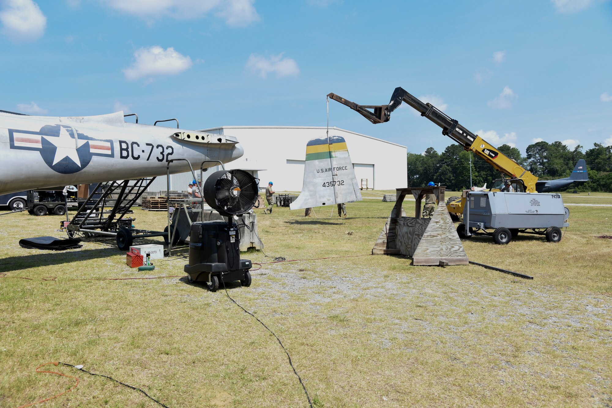 Members of the 117th Maintenance Group disassemble an A-26 Invader at the Museum of Aviation, Warner Robins, Ga., June 22, 2020. This aircraft will be relocated to Sumpter Smith Joint National Guard Base, Birmingham, Ala. (U.S. Air National Guard photo by: Tech. Sgt. Jim Bentley)