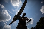 U.S. Army Staff Sgt. Dana Eustace, a Soldier attending the 254th Regional Training Institute’s RQ-11B Raven course, assembles aircraft parts during their capstone field training exercise on Joint Base McGuire-Dix-Lakehurst, N.J.,  July 22, 2020.