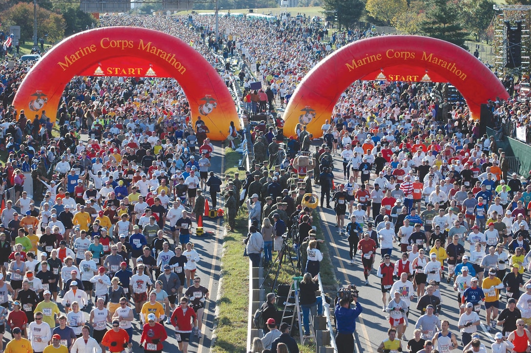 A 105mm Howitzer fires to start the 2017 Marine Corps Marathon , Arlington, Va., Oct. 22, 2017.