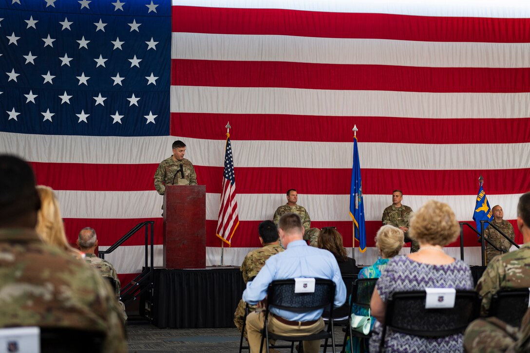 A photo of the wing commander speaking