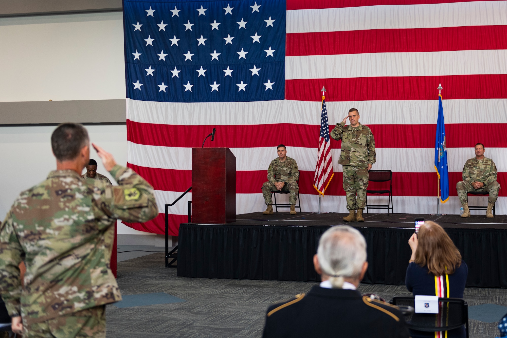 An Airman salutes the new Mission Support Group commander