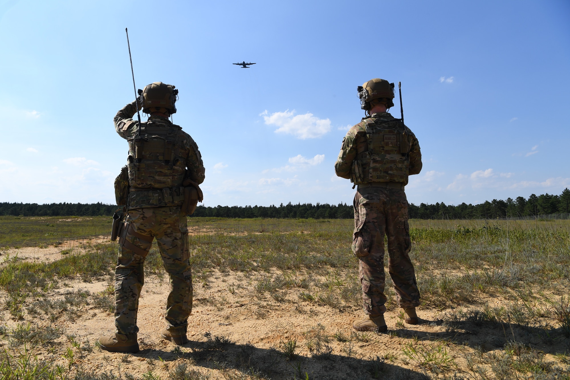 Capt. David Chan, 621st Mobility Support Operations Squadron Air Mobility Liaison Officer, and Maj. Clark Beesemyer, 621st MSOS AMLO, conduct drop zone and landing zone operations refresher training at Joint Base McGuire-Dix-Lakehurst, New Jersey, July 21, 2020. The 621st MSOS Summit is mission-essential training held biannually to ensure full-spectrum readiness.