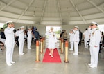 Woman saluting