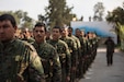 Members of the Syrian Democratic Forces stand in formation during a victory announcement ceremony over the defeat of Daesh’s so-called physical caliphate Mar. 23, 2019 at Omar Academy, Deir ez-Zor, Syria. The Global Coalition will continue addressing the threat Daesh continues to pose to the partner nations and allies, while preventing any return or resurgence in liberated areas. (U.S. Army photo by Staff Sgt. Ray Boyington)