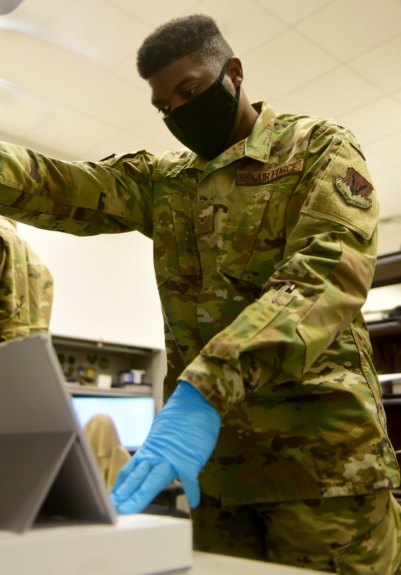 An Airmen examines a tablet at Creech Air Force Base, Nevada.