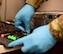 An Airmen grabs a screwdriver to remove hardware at Creech Air Force Base, Nevada.