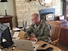 Command Sgt. Maj. Kyle Ford, 336th Expeditionary Military Intelligence Brigade command sergeant major, answers live questions during the brigade’s virtual battle assembly from Black Forest, CO, March 21, 2020. (US Army photo by Command Sgt. Maj. Kyle Ford)