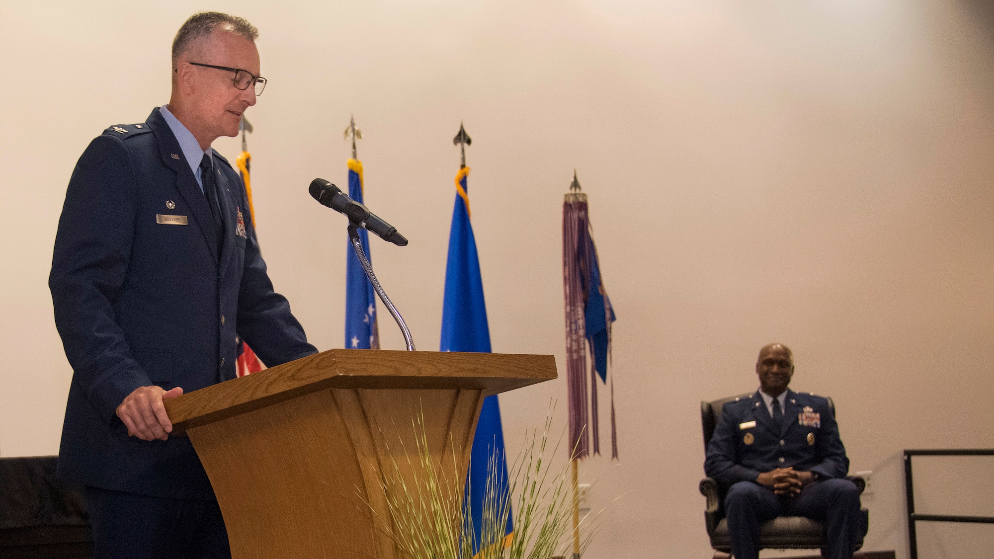 Col. Terry Koester speaks during 982nd TRG change of command