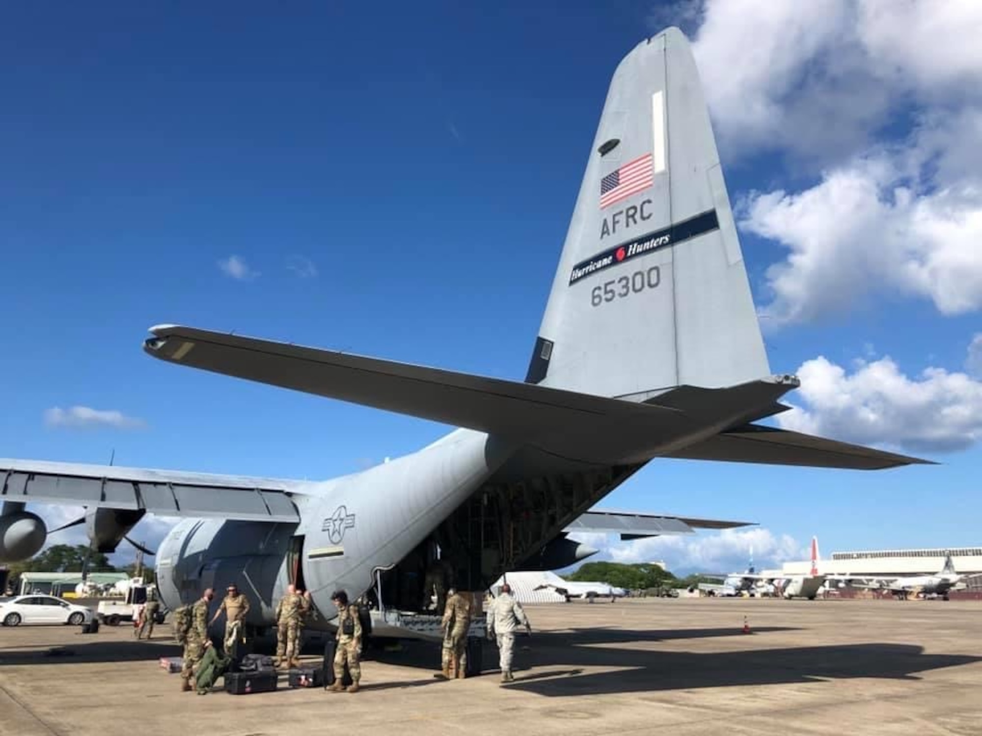 Reserve Citizen Airmen with the 53rd Weather Reconnaissance Squadron “Hurricane Hunters,” offload from a WC-130J Super Hercules aircraft July 23, 2020 at Barbers Point Kapolei Airport, Hawaii. The Air Force Reserve unit assigned to the 403rd Wing at Keesler Air Force Base, Mississippi, are scheduled to fly data-gathering missions into Hurricane Douglas starting July 25. (U.S. AIr Force photo by Lt. Col. Marnee A.C. Losurdo)