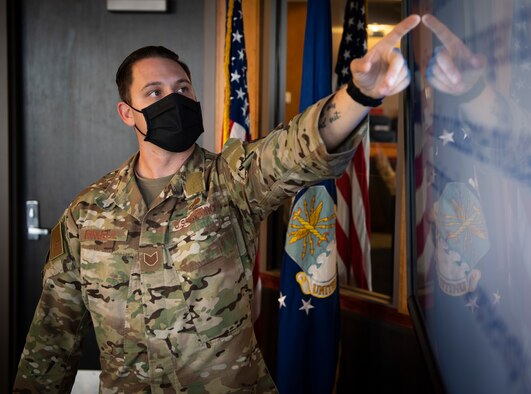 Tech. Sgt. Lee Rimell, Schriever Comptroller Squadron quality assurance manager, practices briefing an annual violence prevention and sexual assault prevention training, July 24, 2020, at Schriever Air Force Base, Colorado. The Secretary of Defense sent down new guidance solidifying the Department of Defense’s zero tolerance policy on discrimination and addressing new ways to combat discrimination in the workplace. (U.S. Air Force photo by Airman 1st Class Jonathan Whitely)
