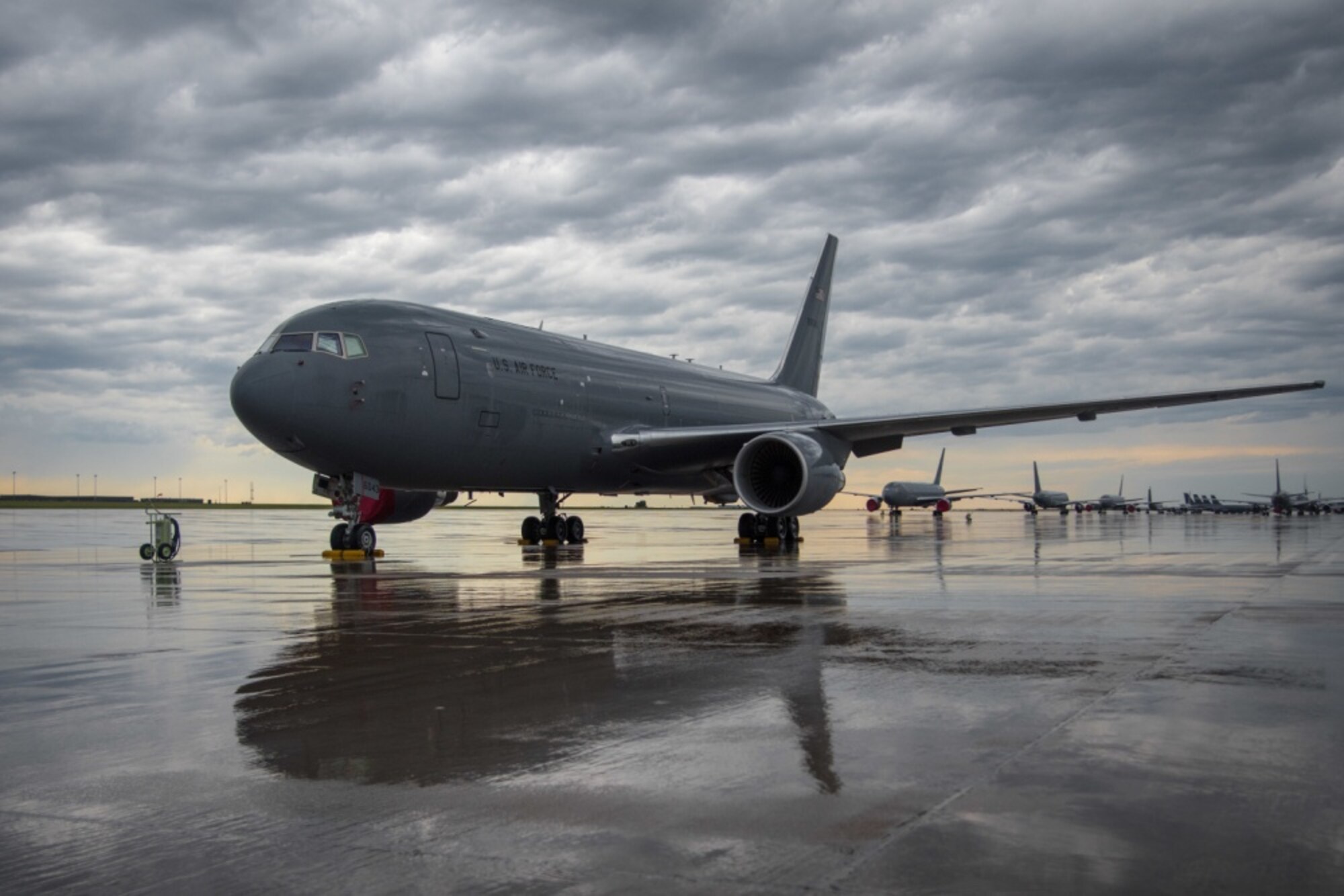 After heavy rains, a KC-46A Pegasus sits on the flightline July 9, 2020, at McConnell Air Force Base, Kansas. The 22nd Air Refueling Wing is home to KC-46 and KC-135 Stratotanker aircraft, two of three tankers used to support aerial refueling operations in the Air Force. (U.S. Air Force photo by Airman 1st Class Marc A. Garcia)