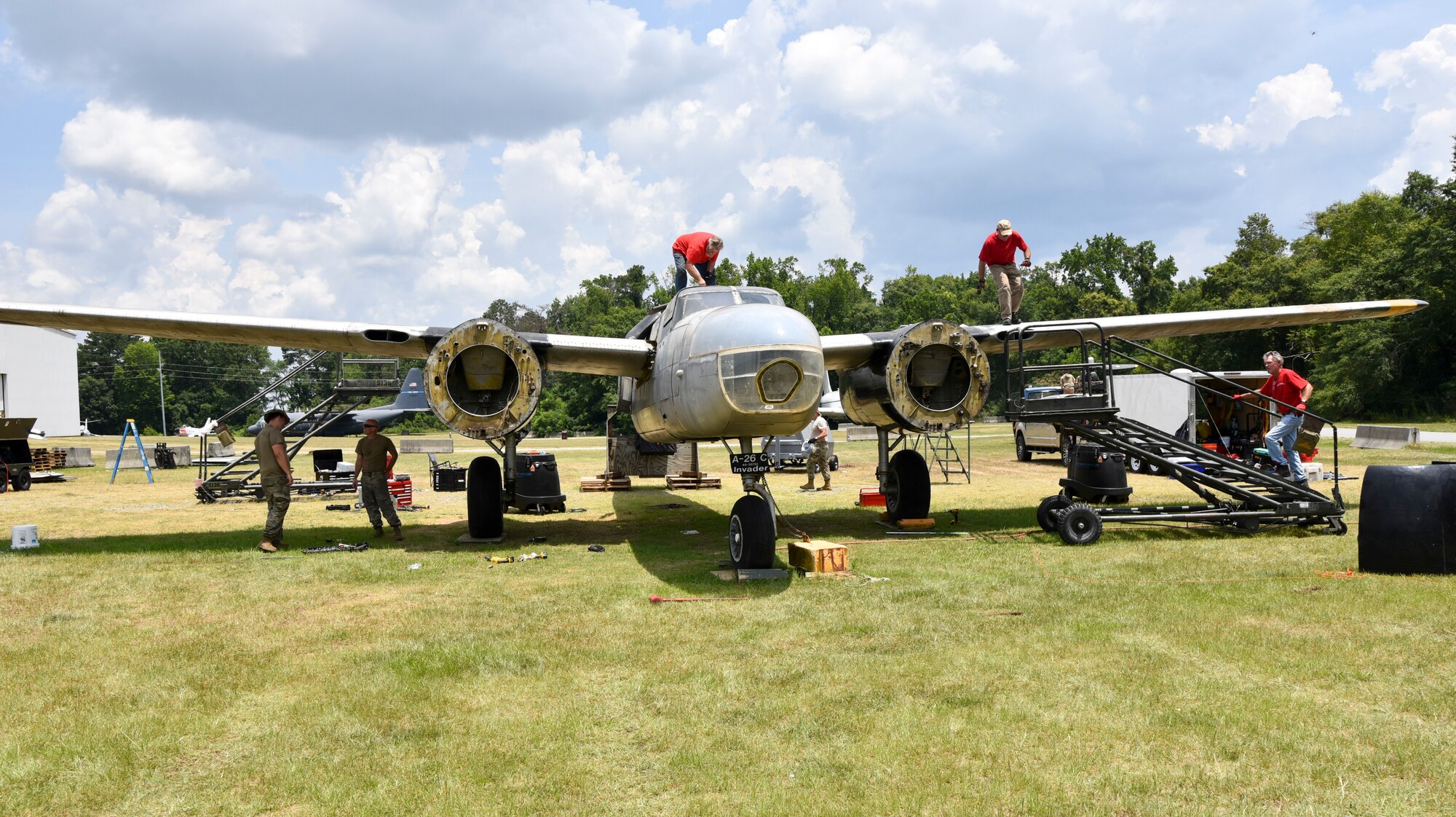 Members of the 117th Maintenance Group disassemble an A-26 Invader at the Museum of Aviation, Warner Robins, Ga., June 22, 2020. This aircraft will be relocated to Sumpter Smith Joint National Guard Base, Birmingham, Ala. (U.S. Air National Guard photo by: Tech. Sgt. Jim Bentley)