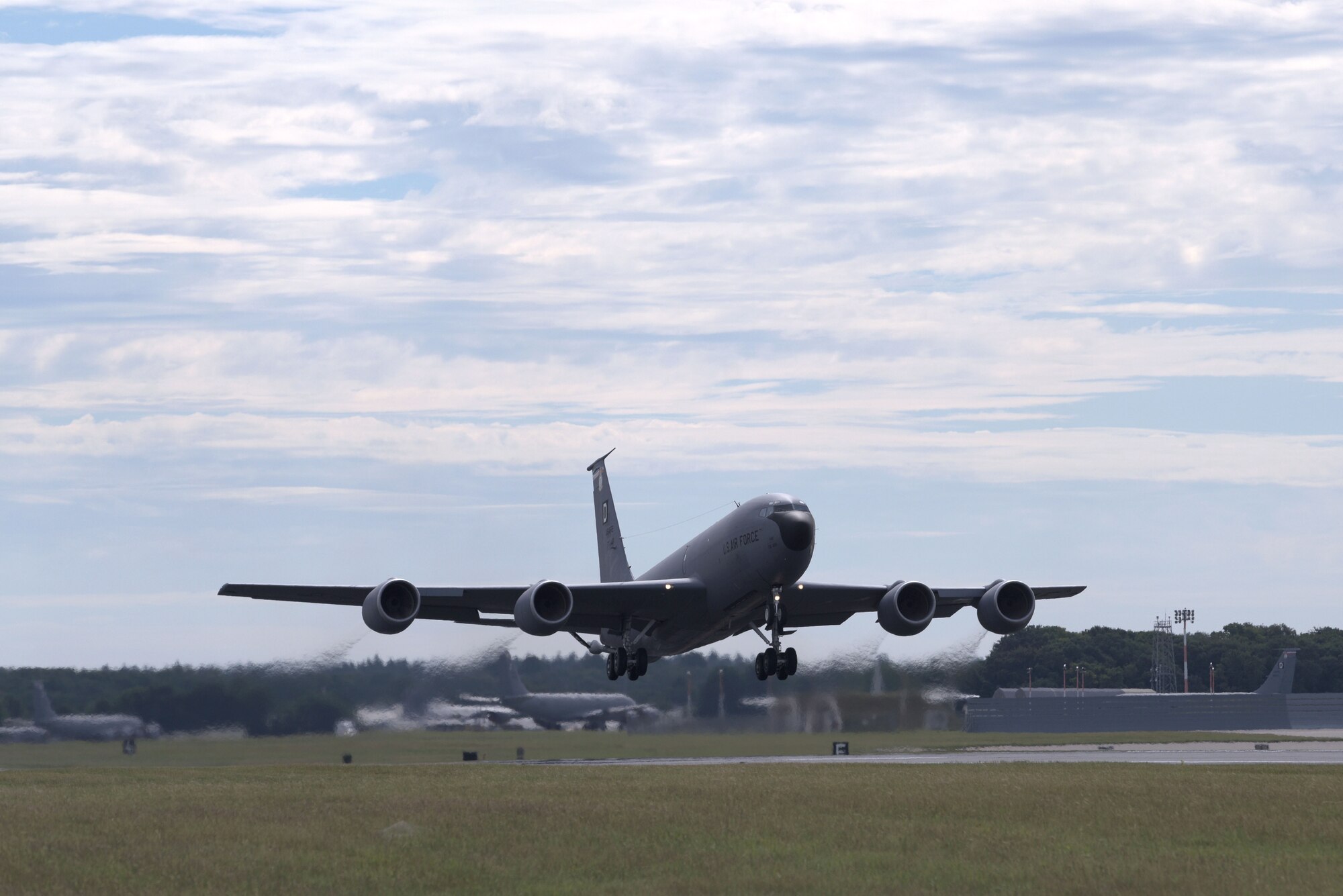 A U.S. Air Force KC-135 Stratotanker, assigned to the 100th Air Refueling Wing, takes off at RAF Mildenahall, July 23, 2020. The 100th ARW is the only permanent U.S. air refueling wing in the European theater, providing the critical air refueling "bridge" which allows the Expeditionary Air Force to deploy around the globe at a moment's notice. (U.S. Air Force photo by Senior Airman Benjamin Cooper)