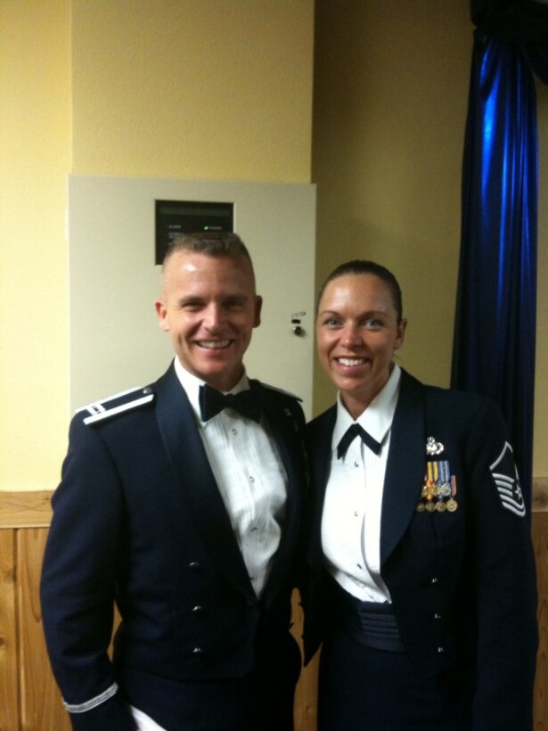 man and women in uniform standing together