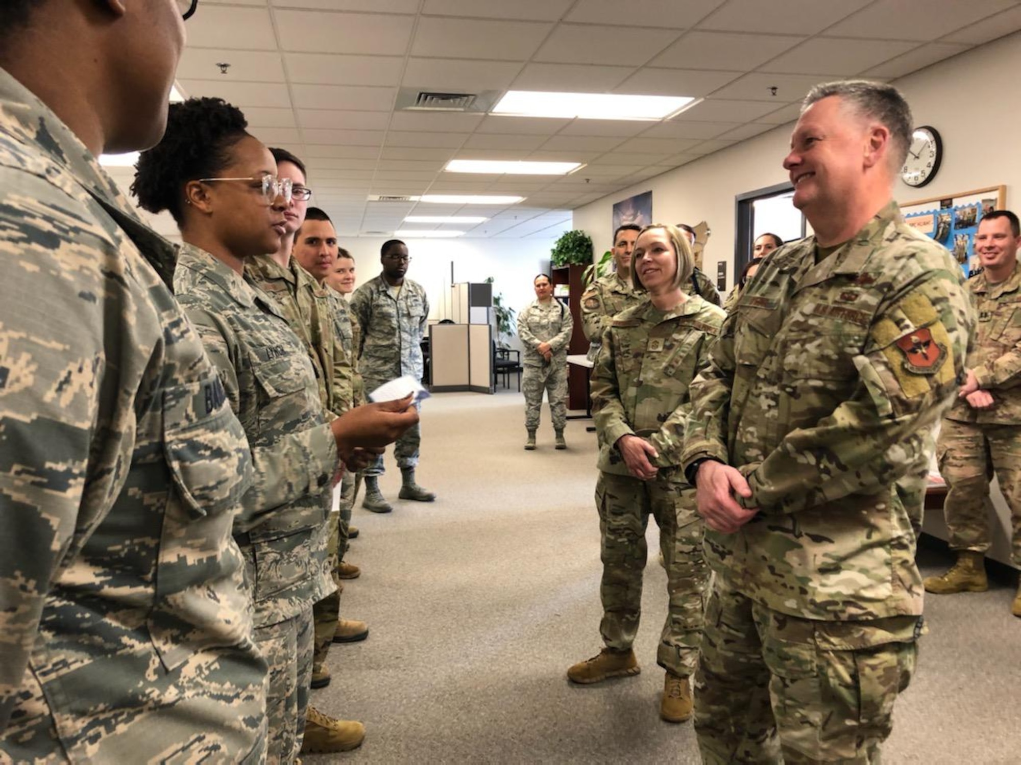 group of Airmen talking