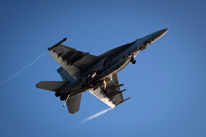 200725-N-RU084-1176 MEDITERRANEAN SEA (July 25, 2020) An F/A-18F Super Hornet, attached to the "Fighting Swordsmen" of Strike Fighter Squadron 32, conducts routine flight operations. The Dwight D. Eisenhower Strike Group is conducting operations in U.S. 6th fleet area of operations in support of U.S. national security interests in Europe and Africa. (U.S. Navy photo by Mass Communication Specialist 1st Class Aaron Bewkes)