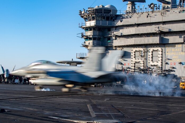 200725-N-RU084-1323 MEDITERRANEAN SEA (July 25, 2020) An F/A-18 Super Hornet lands on the flight deck aboard the Nimitz-class aircraft carrier USS Dwight D. Eisenhower (CVN 69). The Dwight D. Eisenhower Strike Group is conducting operations in U.S. 6th fleet area of operations in support of U.S. national security interests in Europe and Africa. (U.S. Navy photo by Mass Communication Specialist 1st Class Aaron Bewkes)