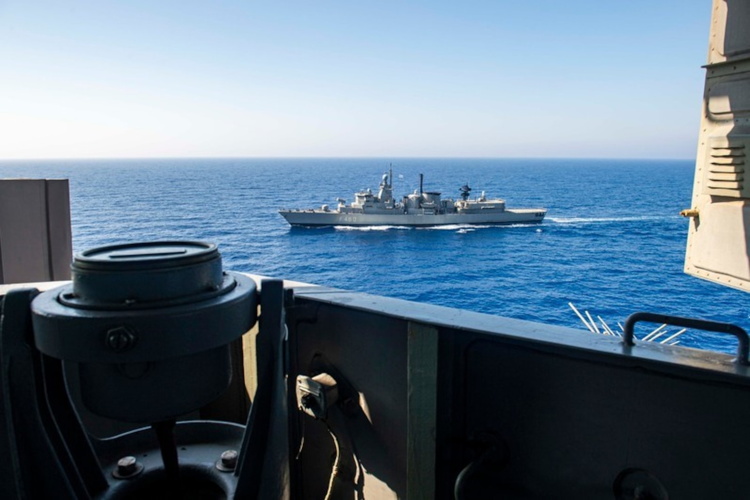 200726-N-KT825-1066 MEDITERRANEAN SEA (July 26, 2020) The Hellenic Navy frigate HN Aegean (FFGH 460) sails alongside the Nimitz-class aircraft carrier USS Dwight D. Eisenhower (CVN 69) in the Mediterranean Sea, July 26, 2020. The Dwight D. Eisenhower Strike Group is conducting operations in U.S. 6th fleet area of operations in support of U.S. national security interests in Europe and Africa. (U.S. Navy photo by Mass Communication Specialist 3rd Class Sawyer Haskins)
