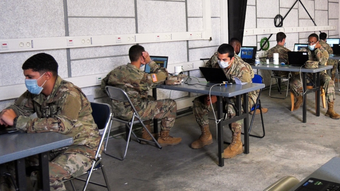 Inbound Soldiers from the United States to Europe, conduct virtual in-processing at the Deployment Processing Center on Rhine Ordnance Barracks in Kaiserslautern, Germany July 17, 2020. The DPC currently houses incoming personnel from the United States undergoing quarantine and in-processing to the European theater. Task Force Wilkommen is a group of organizations facilitating this process during the COVID-19 pandemic. (U.S. Army Reserve photo by Staff Sgt. Chris Jackson/Released)