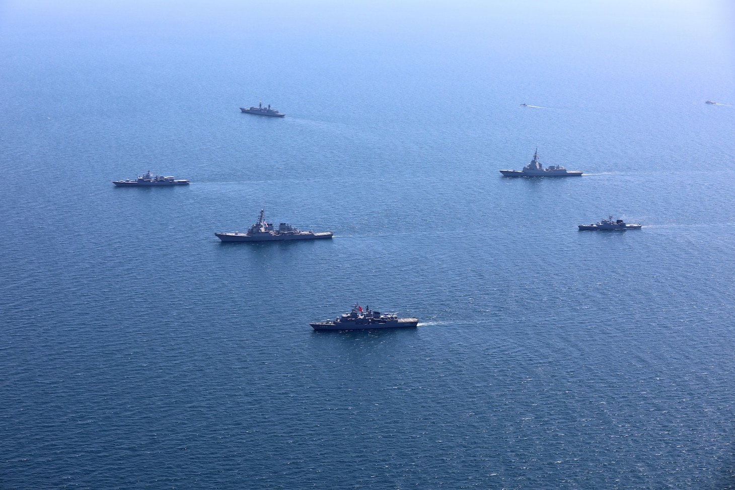 200724-O-NO901-0003 BLACK SEA (July 24, 2020) Ships and aircraft from eight nations sail in formation during a photo exercise while participating in exercise Sea Breeze 2020 in the Black Sea, July 24, 2020. Sea Breeze is an annual U.S.-Ukrainian co-hosted exercise designed to enhance interoperability between participating nations and strengthen regional security. (Photo courtesy of Ukraine Navy)