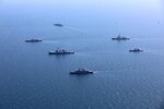 200724-O-NO901-0003 BLACK SEA (July 24, 2020) Ships and aircraft from eight nations sail in formation during a photo exercise while participating in exercise Sea Breeze 2020 in the Black Sea, July 24, 2020. Sea Breeze is an annual U.S.-Ukrainian co-hosted exercise designed to enhance interoperability between participating nations and strengthen regional security. (Photo courtesy of Ukraine Navy)