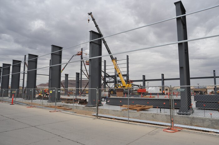 Contractors use a crane to further progress on building the new facility at Production Plant Barstow, Marine Depot Maintenance on the Yermo Annex aboard Marine Corps Logistics Base Barstow, Calif., July 24.