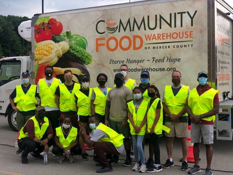 Reserve Citizen Airmen, assigned to the 910th Logistic Readiness Squadron, load food into vehicles on July 7, 2020, at Hickory Highschool in Hermitage, Pennsylvania. The Airmen volunteered their time to support the Community Food Warehouse of Mercer County food drive that serviced approximately 238 vehicles.