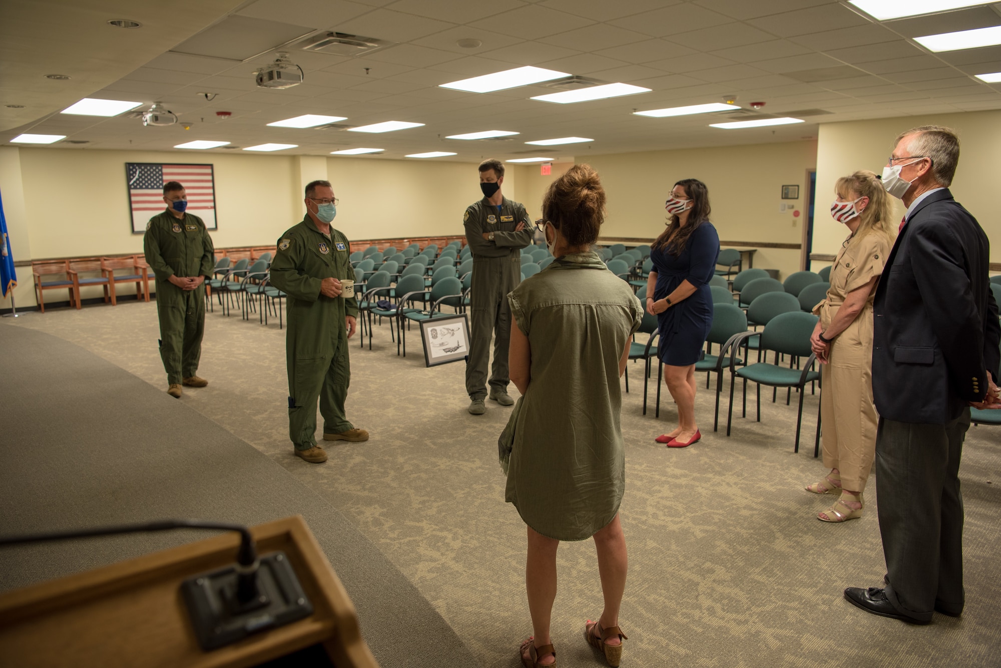 Col. Adam Willis ,315th Airlift Wing Commander, Joint Base Charleston, South Carolina, Col. Don Thigpen,315th Airlift Wing Vice Commander, and Col. Clint ZumBrunnen, 437th Airlift Wing Commander, Joint Base Charleston speak to Charleston community leaders after they were presented artwork July 17, 2020 at Joint Base Charleston. The hand drawn artwork was completed by Senior Airman Mike Liu, aeromedical evacuation technician, 433rd Airlift Wing, Joint Base San Antonio-Lackland, Texas