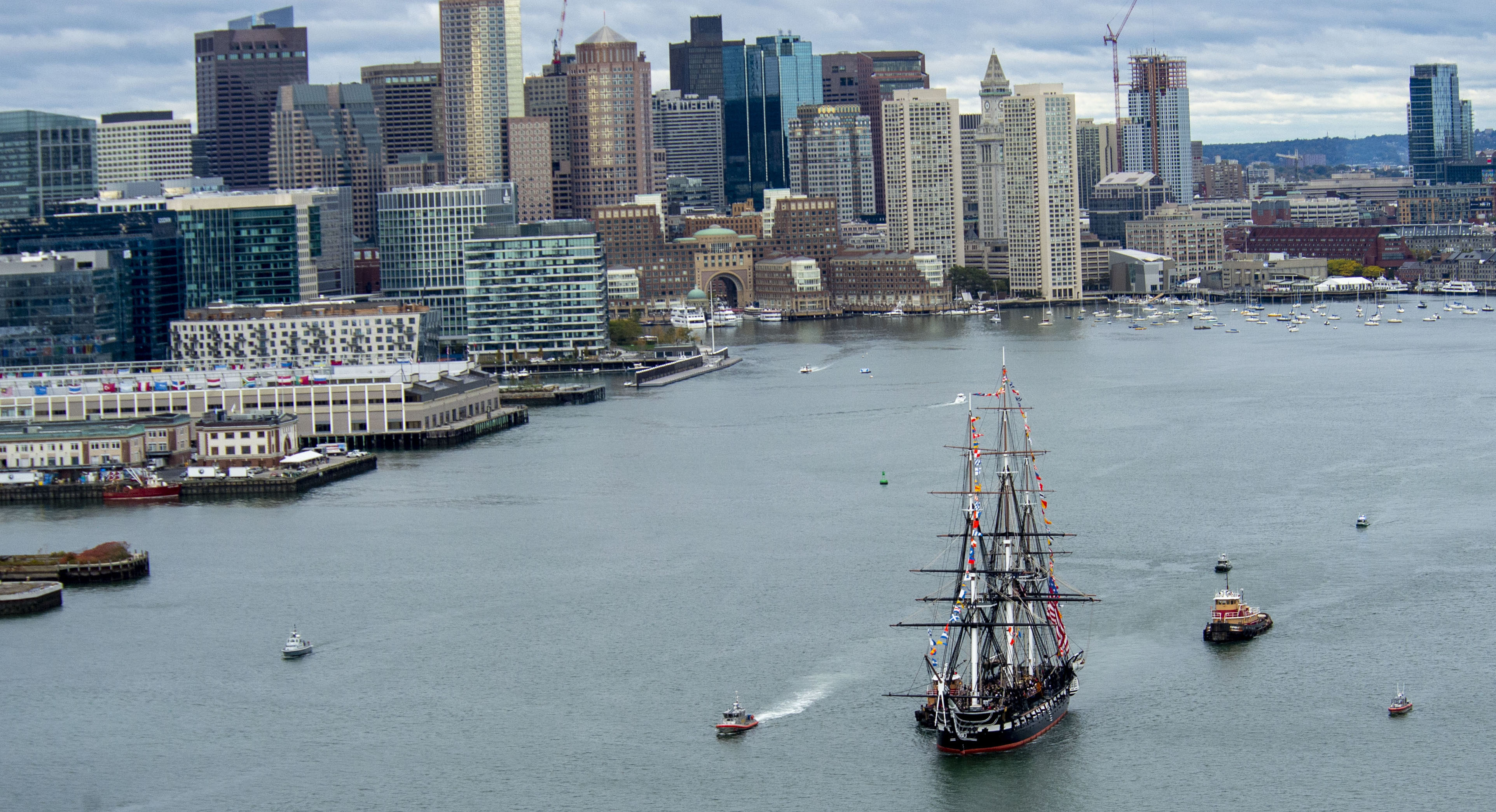Top view of ship sailing through boston harbor