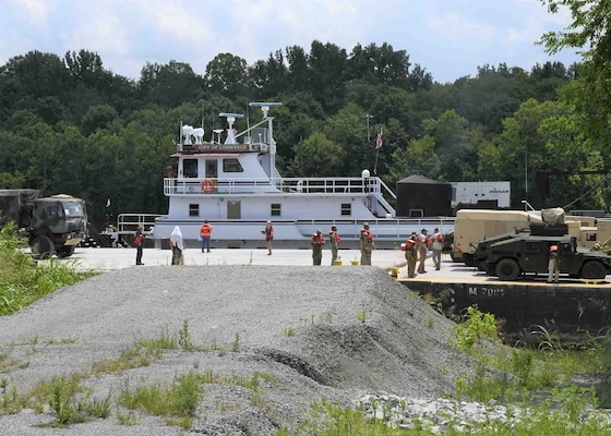 Military Vehicles transit Kentucky Dam