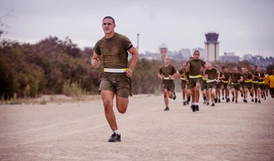 A recruit with Fox Company, 2nd Recruit Training Battalion, participates in a physical training session at Marine Corps Recruit Depot, San Diego, July 21, 2020.
