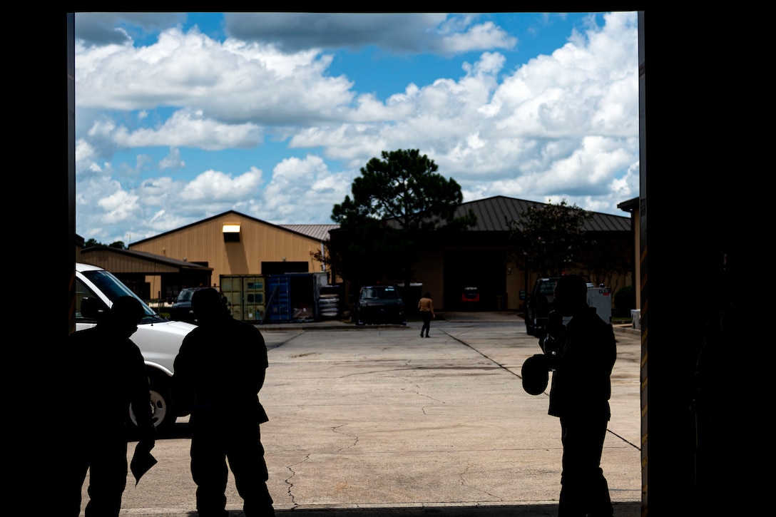 Photo of Airmen arriving for an inspection.