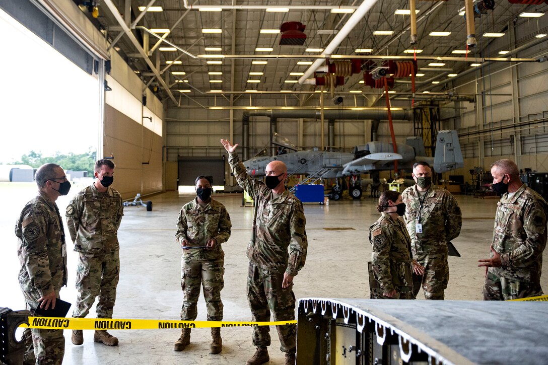 Photo of Airmen briefing the LATT.