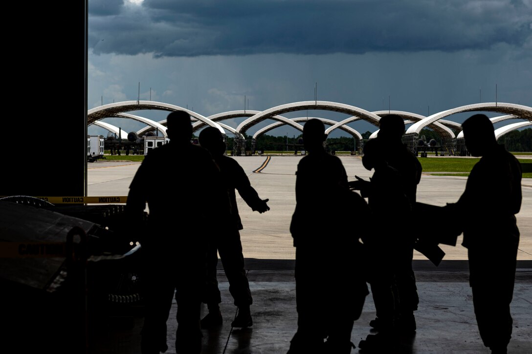 Photo of Airmen briefing the LATT.