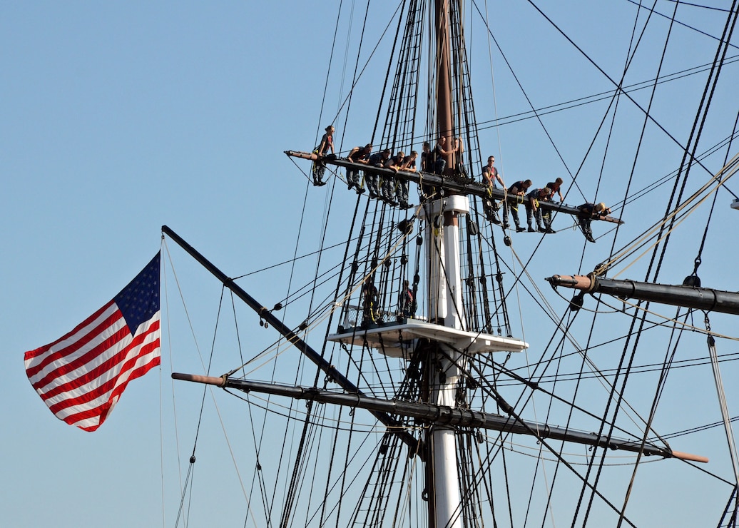 Showing the usa flag waving on topsail