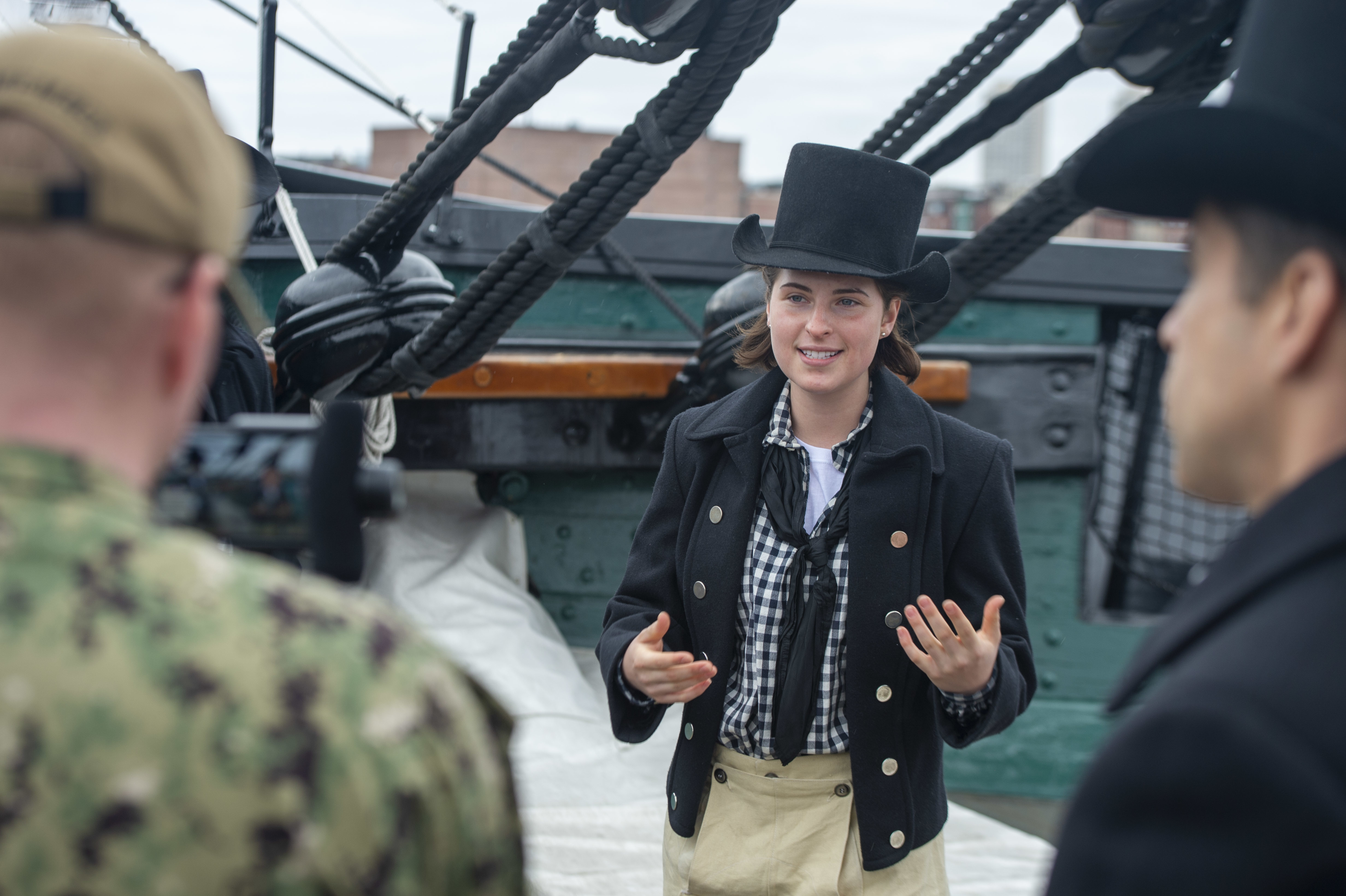 Photo captured Emma Hoernlein in her historic uniform, giving tour and explaining