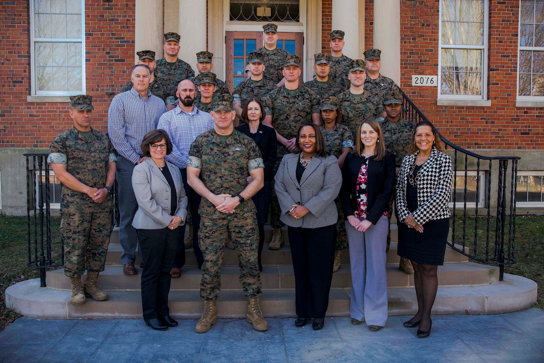 The 19th Sergeant Major of the Marine Corps, Sgt. Maj. Troy E. Black poses for a photo with subject matter experts invited to participate in the Focus Group Summit at Marine Corps Base Quantico, V.A., March 9, 2020. The summit was the second round of meetings to address three focus areas; health, wellness and fitness, Professional Military Education; and recruiting and retention. The three focus areas are Sgt. Maj. Black's priorities in line with the Commandant's Planning Guidance. (U.S. Marine Corps photo by Sgt. Victoria Ross)