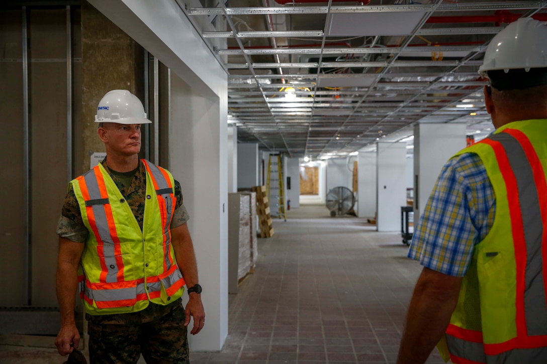 The 19th Sergeant Major of the Marine Corps, Troy E. Black, tours the new Training and Education Command (TECOM) building at Marine Corps Base Quantico, Va, June 15, 2020. The new building is scheduled to be ready next year to bring all of TECOM under one roof. The Sergeant Major of the Marine Corps conducted the visit to receive updates on TECOM’s mission to execute the Commandant of the Marine Corps' Title 10 institutional responsibilities to train and educate the force in order to ensure Marines are prepared to meet the challenges of present and future operational environments. (U.S. Marine Corps photo by Sgt. Victoria Ross)