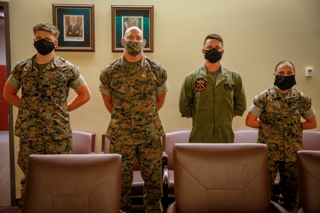 The 19th Sergeant Major of the Marine Corps, Sgt. Maj. Troy E. Black poses for a photo with Marines from Marine Helicoptor Squadron One (HMX-1) at Marine Corps Base Quantico, V.A., June 15, 2020. HMX-1 is responsible for direct support of the President. (U.S. Marine Corps photo by Sgt. Victoria Ross)