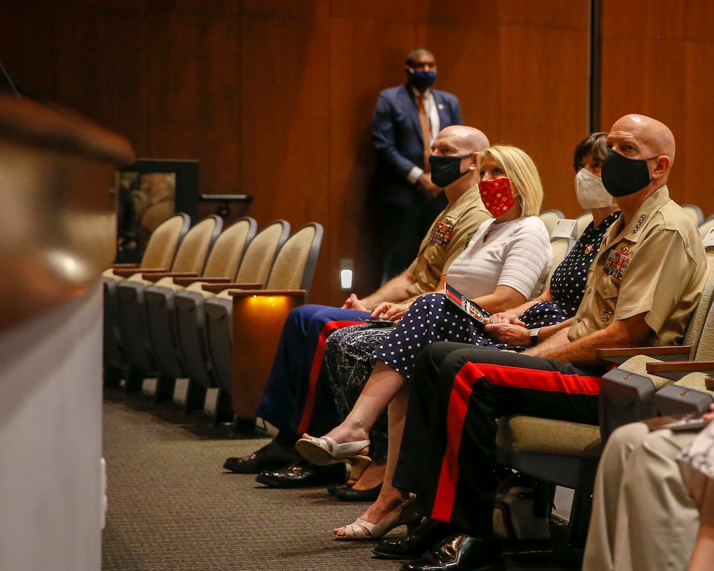 The 19th Sergeant Major of the Marine Corps, Sgt. Maj. Troy E. Black and his wife, Mrs. Stacie Black accompany the Commandant, General David H. Berger and his wife, Mrs. Donna Berger at the Marine Corps Recruiting Command (MCRC) change of command ceremony at Marine Corps Base Quantico, V.A., July 17, 2020. Major General James W. Bierman relinquished command to the new MCRC Commander, Brigadier General Jason Q. Bohm. The traditions exhibited in the ceremony represent the passing of authority from one commander to another. (U.S. Marine Corps photo by Sgt. Victoria Ross)