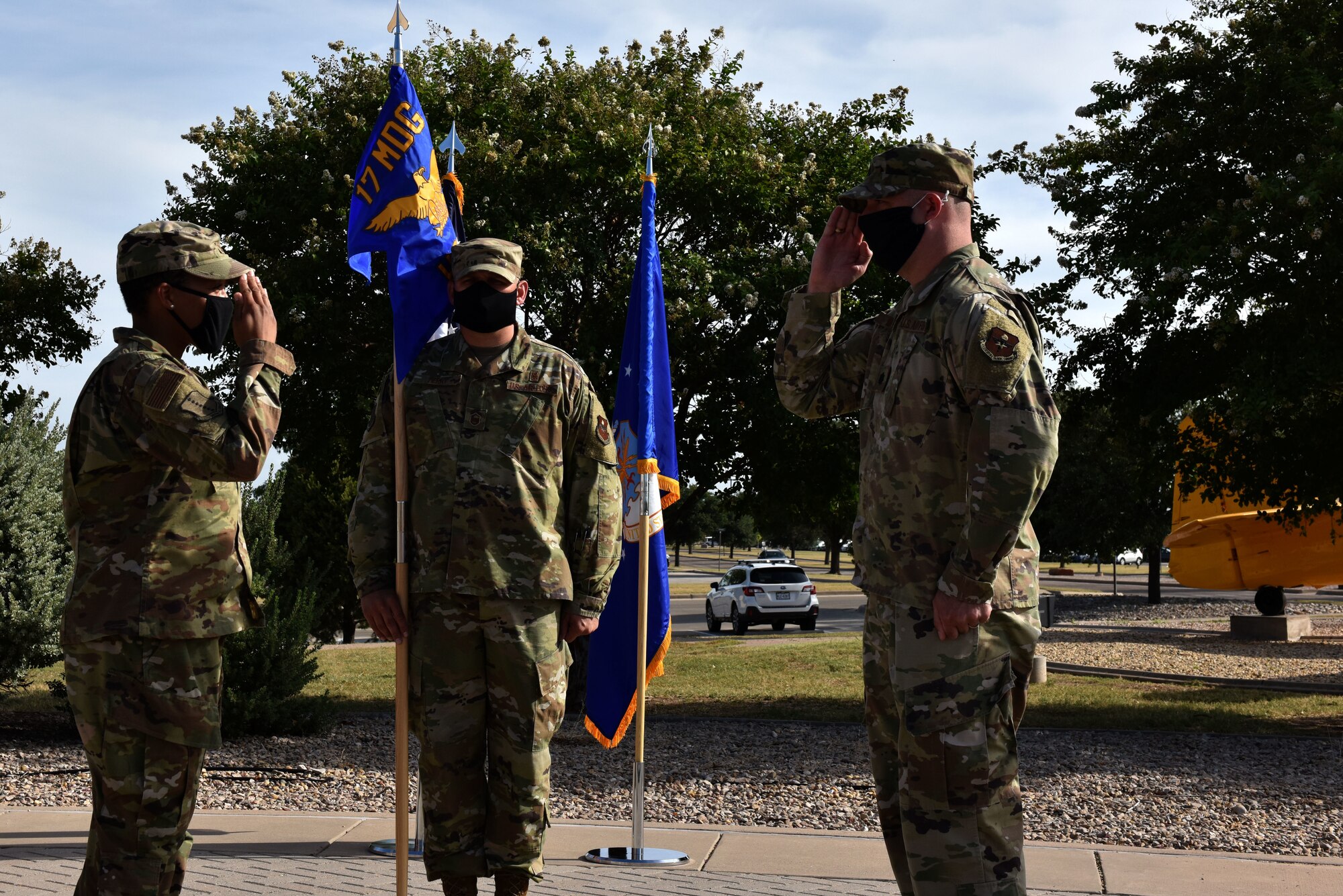 U.S. Air Force Lt. Col. Danny Dacey, 17th Healthcare Operations Squadron incoming commander, salutes Col. Lauren Byrd, 17th Medical Group commander, accepting command of the squadron at the 17th HCOS change of command ceremony in front of the Norma Brown Building on Goodfellow Air Force Base, Texas, July 27, 2020. Dacey took over command responsibilities of Lt. Col. Warren Conrow, who commanded the unit since its activation in August and previously the 17th Medical Support Squadron. (U.S. Air Force photo by Senior Airman Seraiah Wolf)