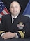Portrait of LCDR Andrew Broyles in his navy uniform
