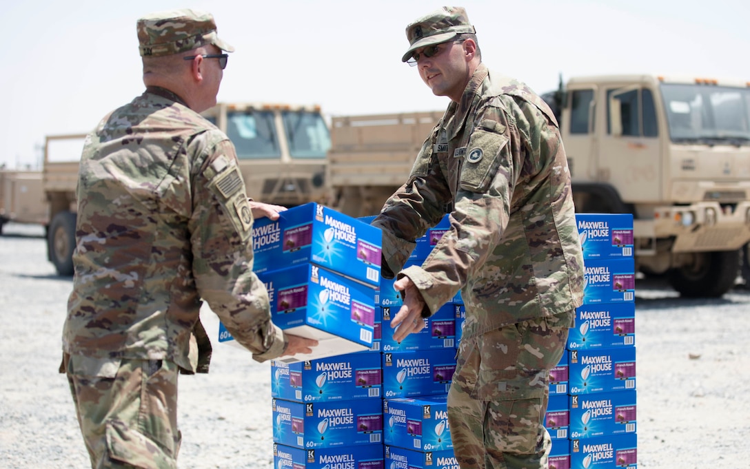 Grounded in giving: Chaplains transport donated coffee at Camp Arifjan