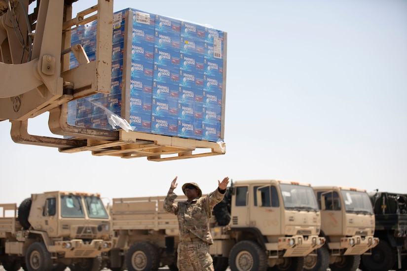 Grounded in giving: Chaplains transport donated coffee at Camp Arifjan