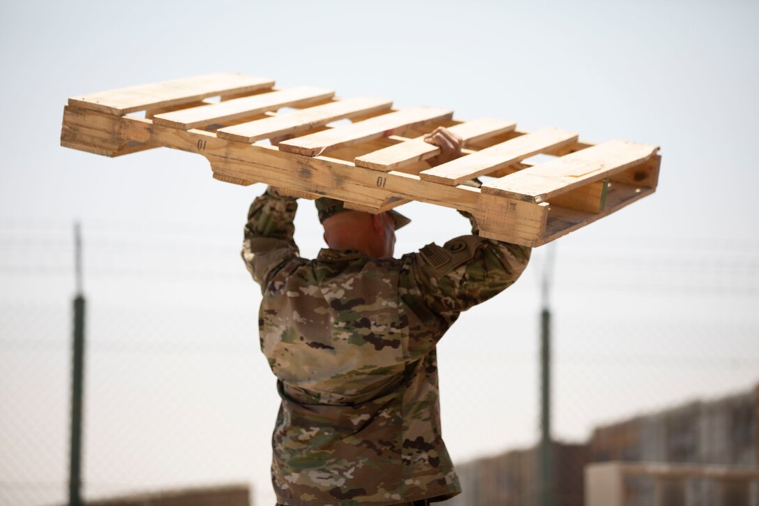 Grounded in giving: Chaplains transport donated coffee at Camp Arifjan